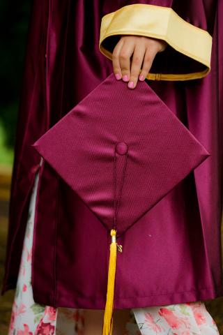 photo of a graduate in a cap and gown
